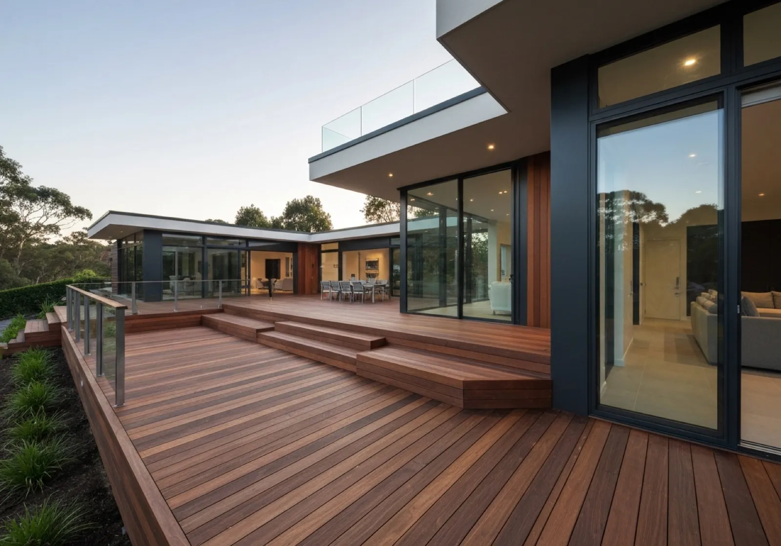 Hardwood timber deck with wide steps wrapping around a modern Adelaide home